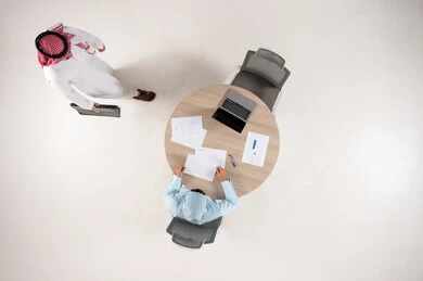 Top View of Saudi Businessman Meeting in Office
