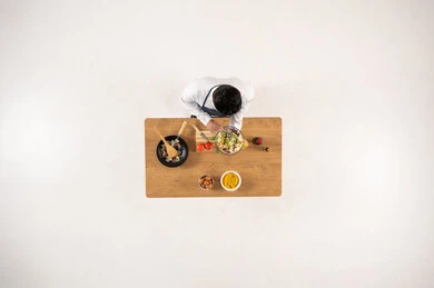 Arab Man Preparing Healthy Vegetable Salad Top View