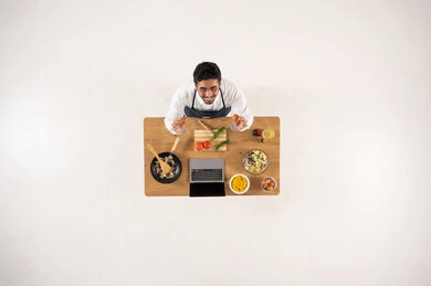 Arab Man Chef Cooking with Laptop on White Background