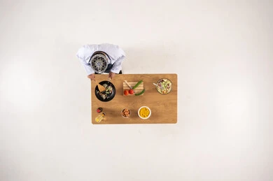 Omani Man Cooking Traditional Food Overhead View