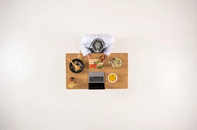 Saudi Man Cooking with Laptop Top Down Overhead View