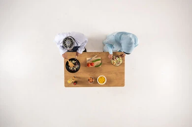 Omani Couple Cooking in Kitchen Top Down View