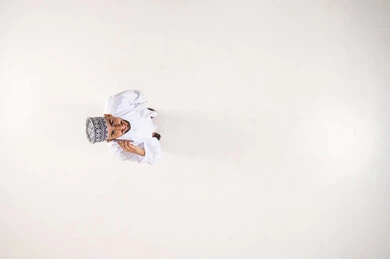 Omani Man in Traditional Dress Top View White Background
