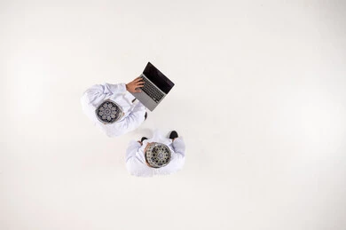 Omani Men with Laptop on White Background Top View