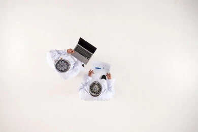 Omani Men Business Collaboration Top Down View