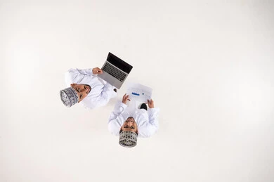 Omani Businessmen with Laptop Top View White Background