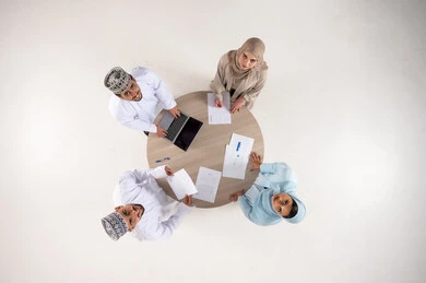 Omani Business Professionals Meeting Overhead View