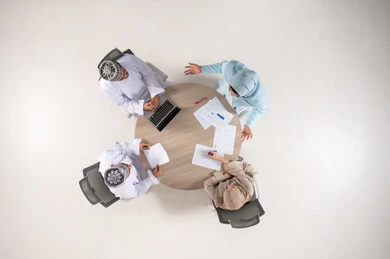 Omani Business Professionals Meeting Top Down Office View