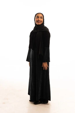 Saudi Woman in Traditional Black Abaya on White Background