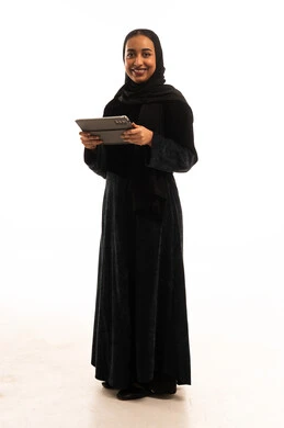 Saudi Woman in Abaya Holding Digital Tablet