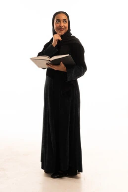 Saudi Woman in Black Abaya Holding Book on White Background