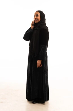 Saudi Woman in Black Abaya Talking on Mobile Phone