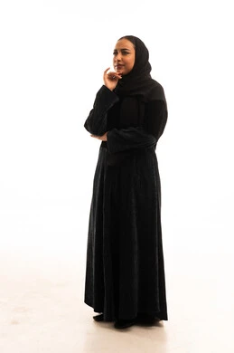 Saudi Woman in Black Abaya Thinking in Studio