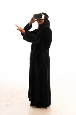 Saudi Woman with VR Headset in Black Abaya