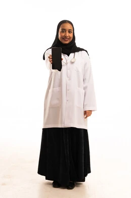 Saudi Female Doctor Holding Smartphone on White Background