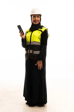 Saudi Female Engineer in Safety Gear and Abaya