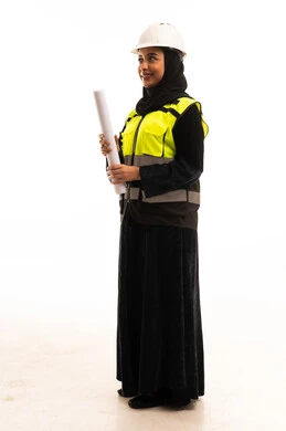 Saudi Female Engineer with Blueprint and Safety Gear