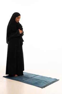 Saudi Muslim Woman Praying in Black Abaya