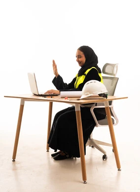 Saudi Female Engineer Laptop Video Call White Background