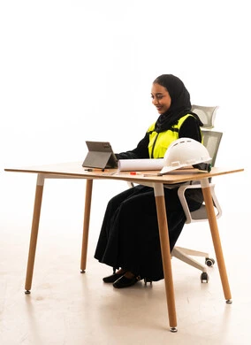 Saudi Woman Engineer Working at Office Desk