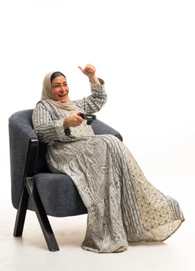 Saudi Woman Playing Video Games and Celebrating
