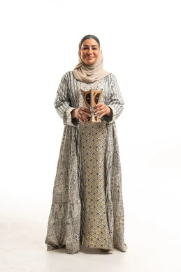 Saudi Woman with Incense Burner in Traditional Dress