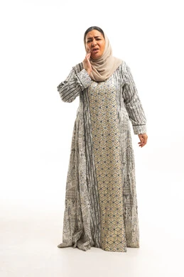 Saudi Woman in Traditional Jalabiya Experiencing Pain
