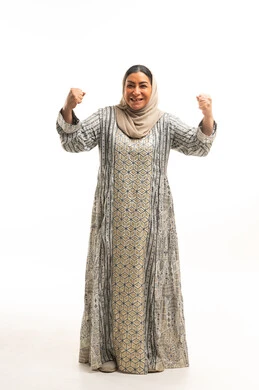 Senior Saudi Woman Traditional Dress Victory Portrait