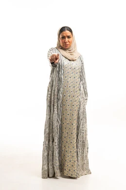 Emirati Woman in Traditional Dress Pointing at Camera