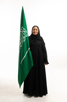 Saudi Woman Holding National Flag on White Background