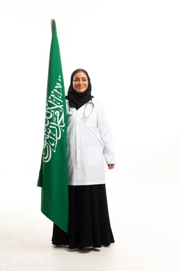 Saudi Female Doctor Holding Saudi Flag on White Background
