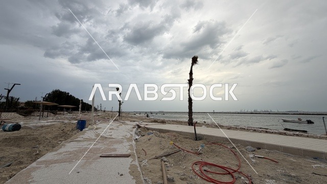 Construction Work at Ship Corniche Dammam Under Cloudy Sky
