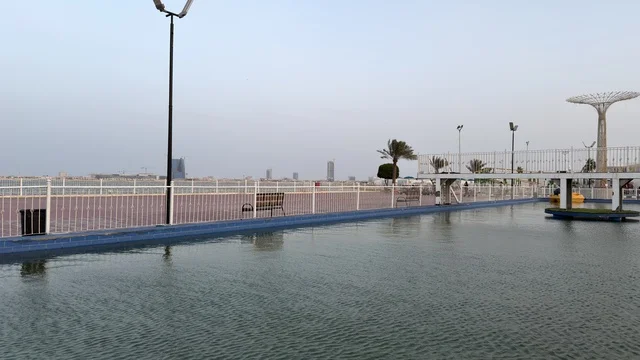 Dolphin Village Dammam Outdoor Pool and City Skyline