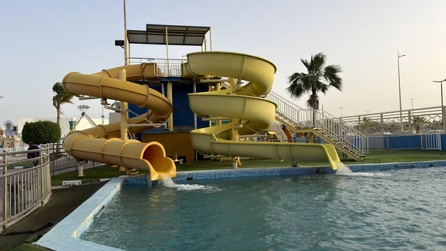 Yellow Water Slides at Dolphin Village Dammam Pool