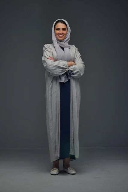 Saudi Woman in Abaya Standing in Studio Portrait