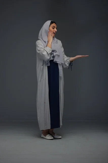 Saudi Woman in Grey Abaya Presentation Studio Portrait