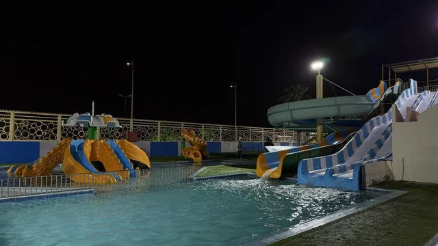 Dolphin Village Dammam Water Slides at Night