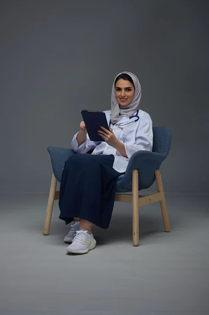 Saudi Female Doctor Using Tablet in Studio