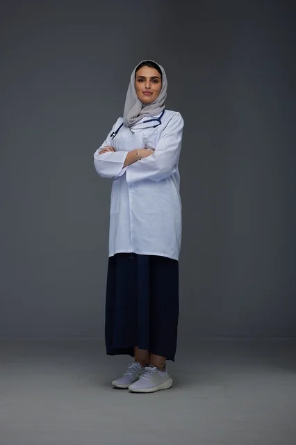 Saudi Female Physician in White Medical Coat
