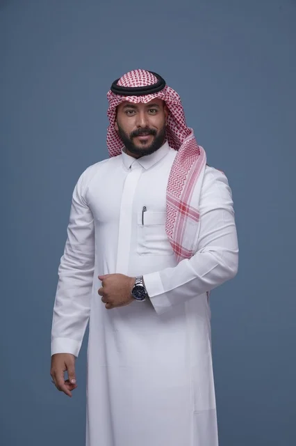 Saudi Man in Traditional Thobe on Blue Background