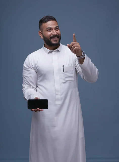 Saudi Man in White Thobe Holding Blank Smartphone