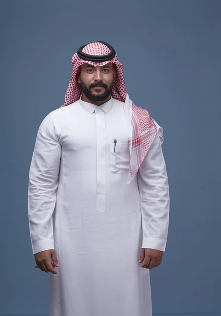 Saudi Man in Traditional Thobe and Shemagh Portrait