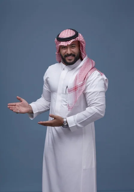 Saudi Man in Traditional Thobe Gesturing in Studio
