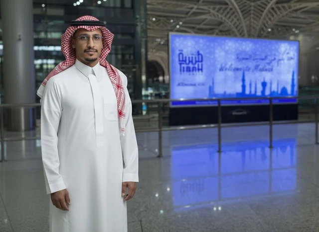 Saudi Man in Traditional Thobe at Madinah Airport