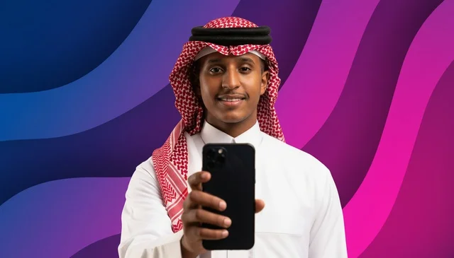 Saudi Man Holding Smartphone on Abstract Background