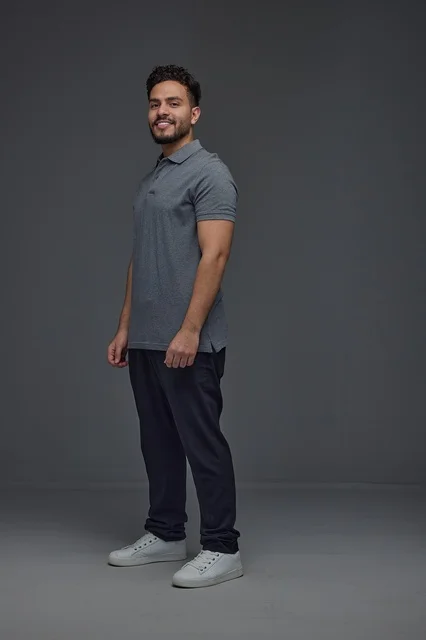 Saudi Man in Casual Wear Standing in Studio Portrait