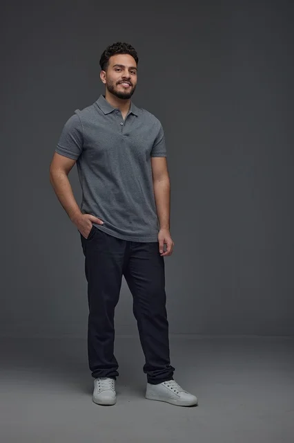 Smiling Saudi Man in Casual Polo Shirt Studio Portrait