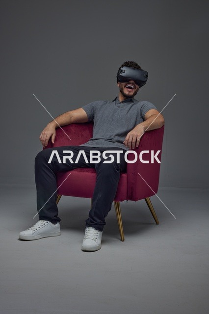 Saudi Man Using Virtual Reality VR Headset in Studio