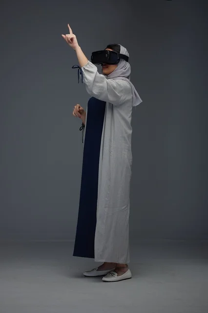 Saudi Woman Using VR Headset in Studio