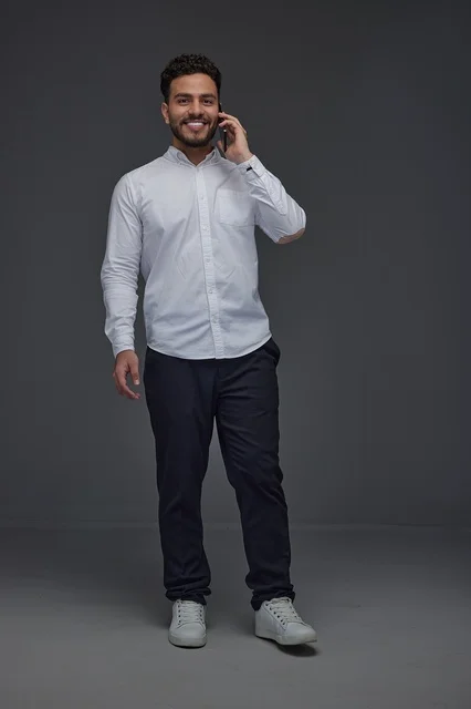 Saudi Man Talking on Smartphone in Studio